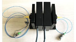 A dual-stage rotation stage coupled to optical fibers at the input and output ports